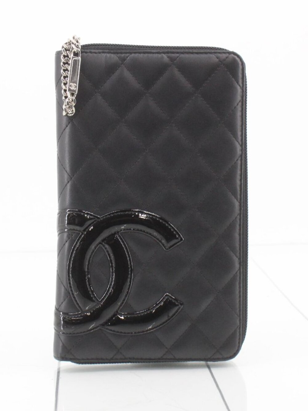 CHANEL Black Quilted Zip-Around Wallet with Patent CC Emblem